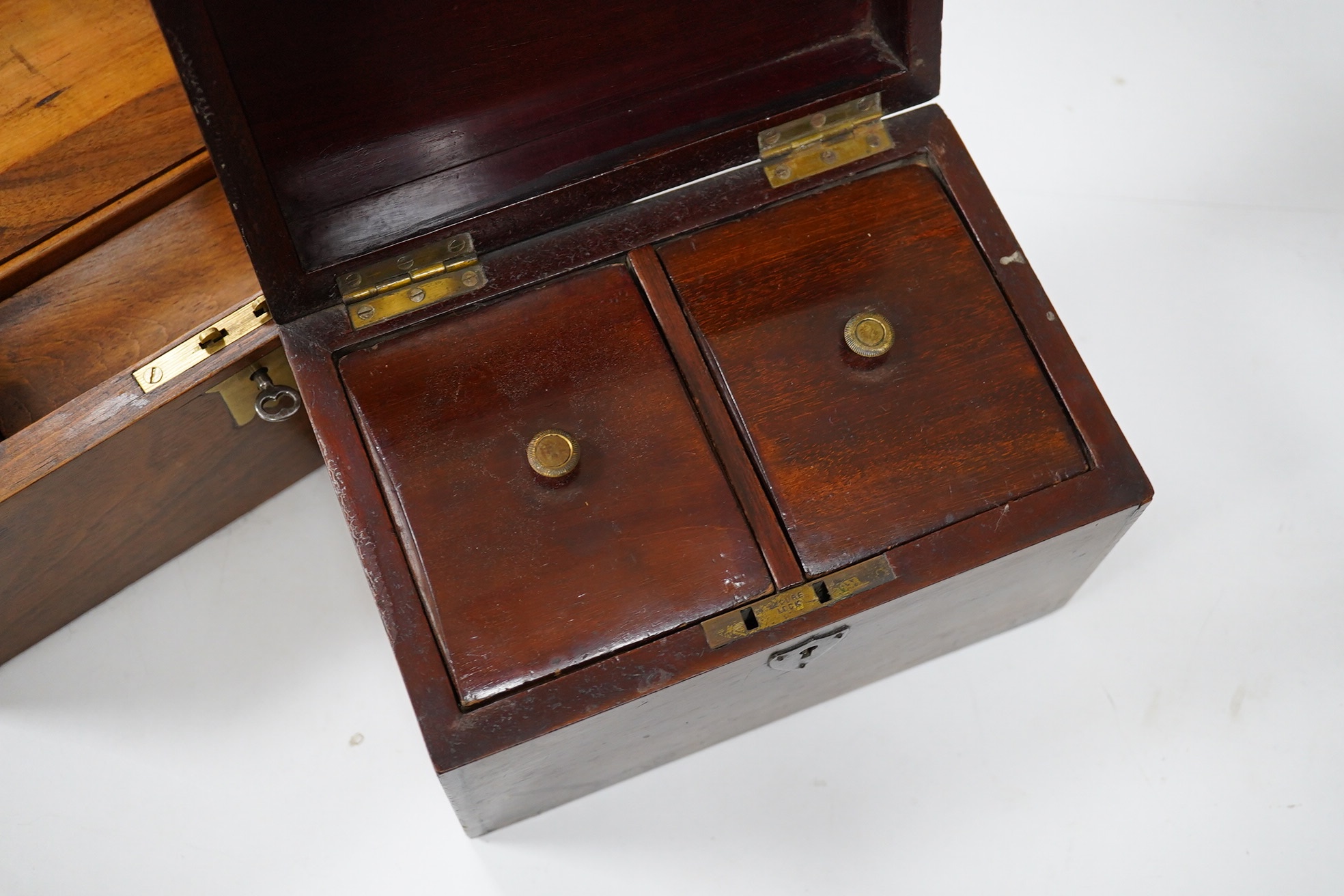 A Victorian brass bound walnut writing box and a mahogany tea caddy, largest 27cm wide. Condition - fair to good